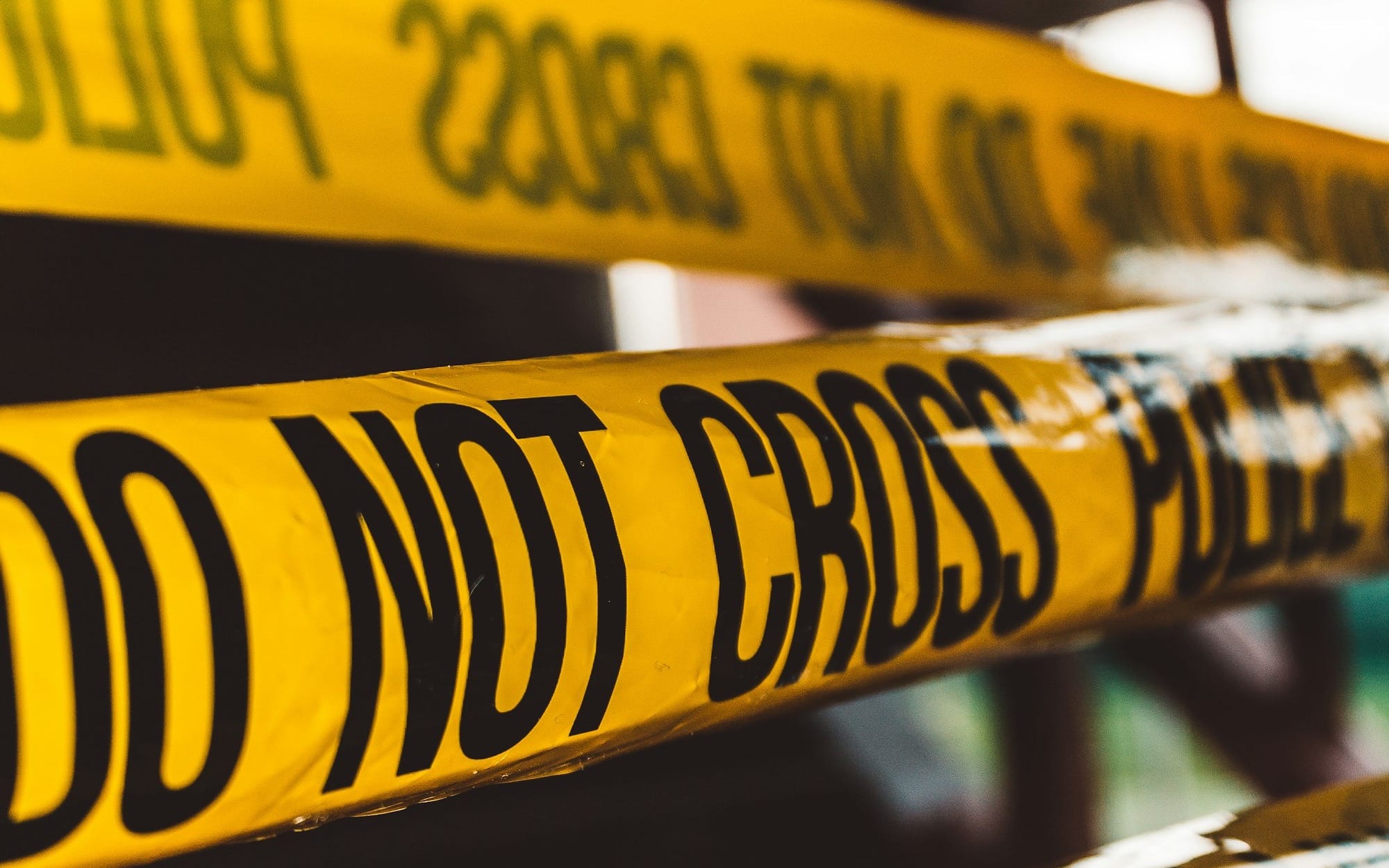 do not cross police barricade tape close-up photography